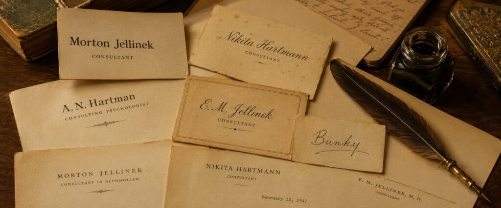 Business cards and letterheads bearing Jellinek's various names: Morton Jellinek, Nikita Hartmann, A. N. Hartman, and E. M. Jellinek